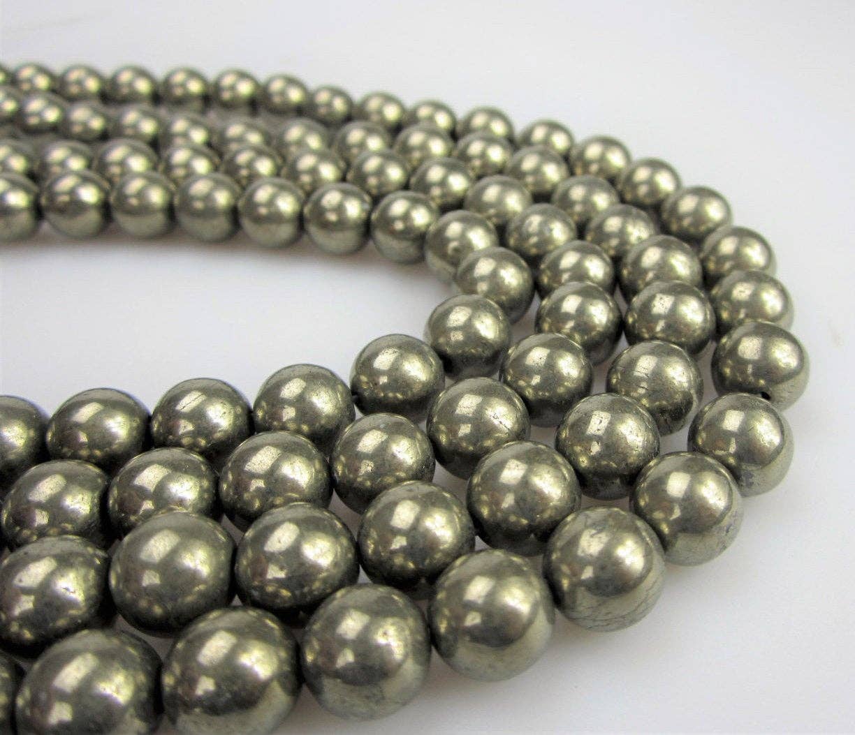 Pyrite Smooth Beads 15.5" Strand: 8mm