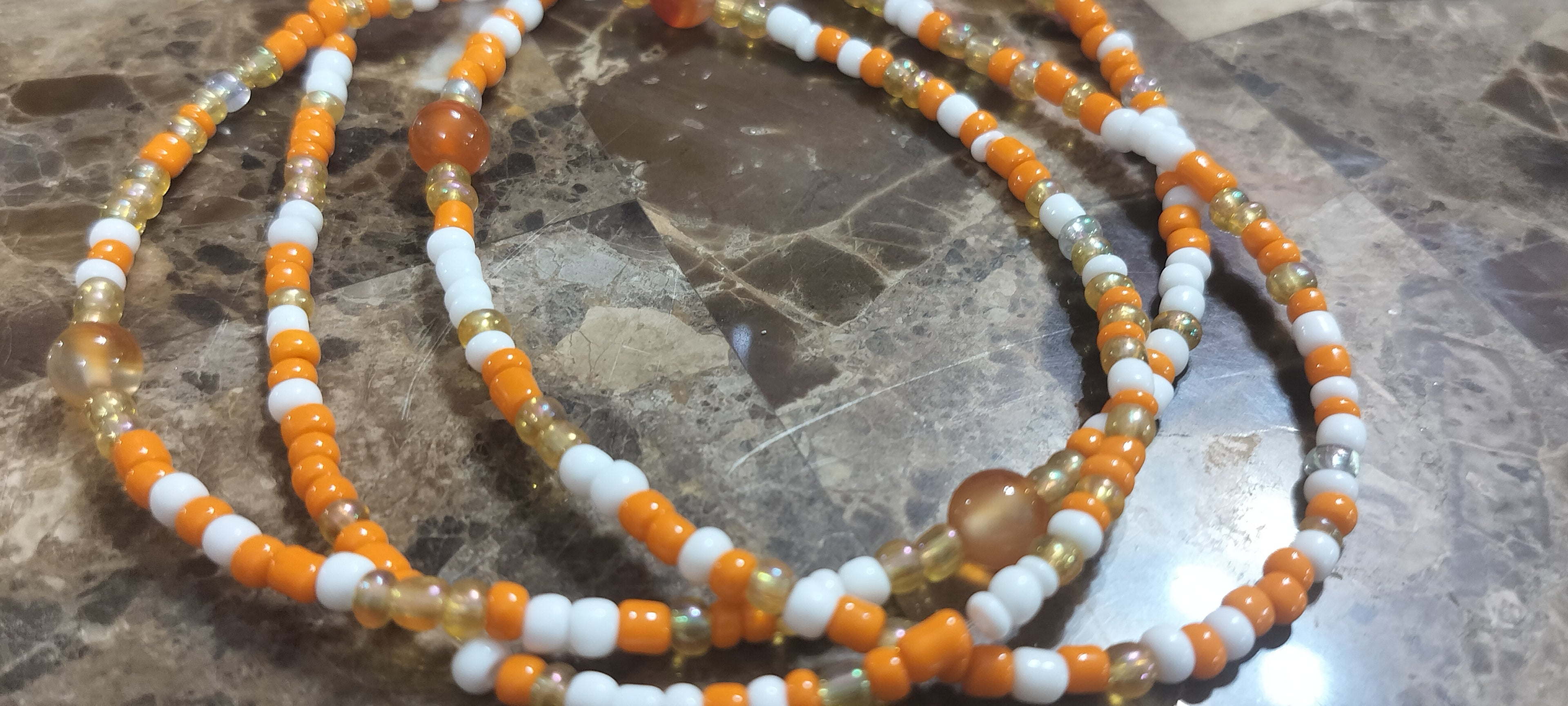 Handmade custom fitted Carnelian Waistbeads by Enchanted Jewelz Empire, Metaphysical store Broward Blvd 
