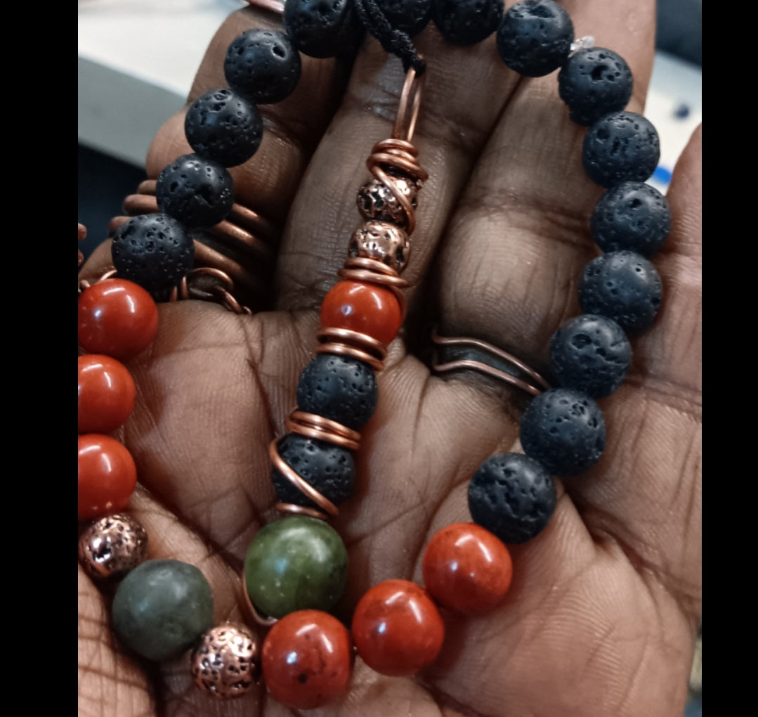 Gemstone bracelet with lava, red Jasper, Jade and copper plated lava. Includes matching necklace. Handmade at Enchanted Jewelz Empire, Black owned Metaphysical family friendly business in Ft Lauderdale 