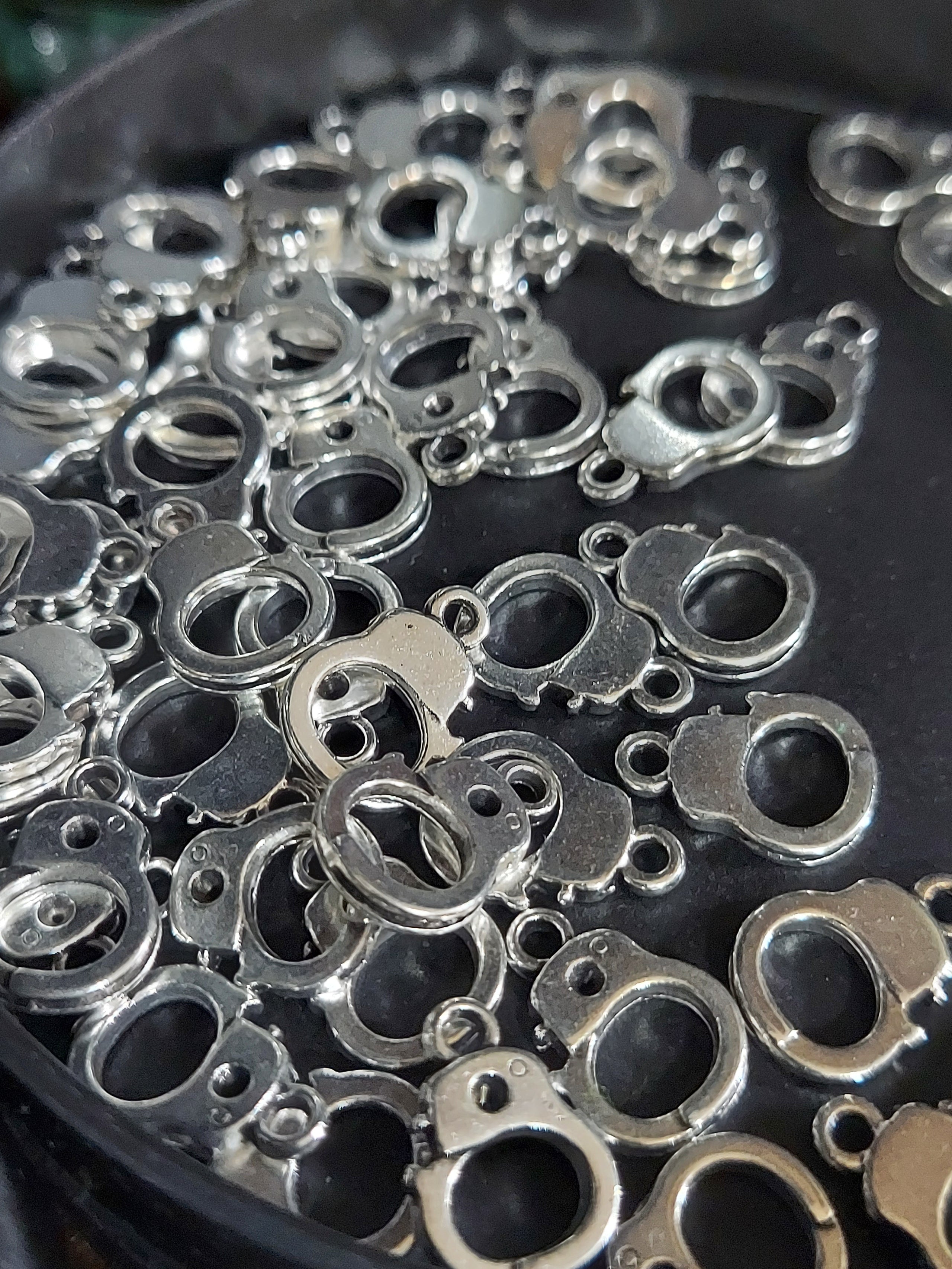 Silver-tone Hand-Cuff Charms